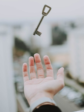 a key in a hand